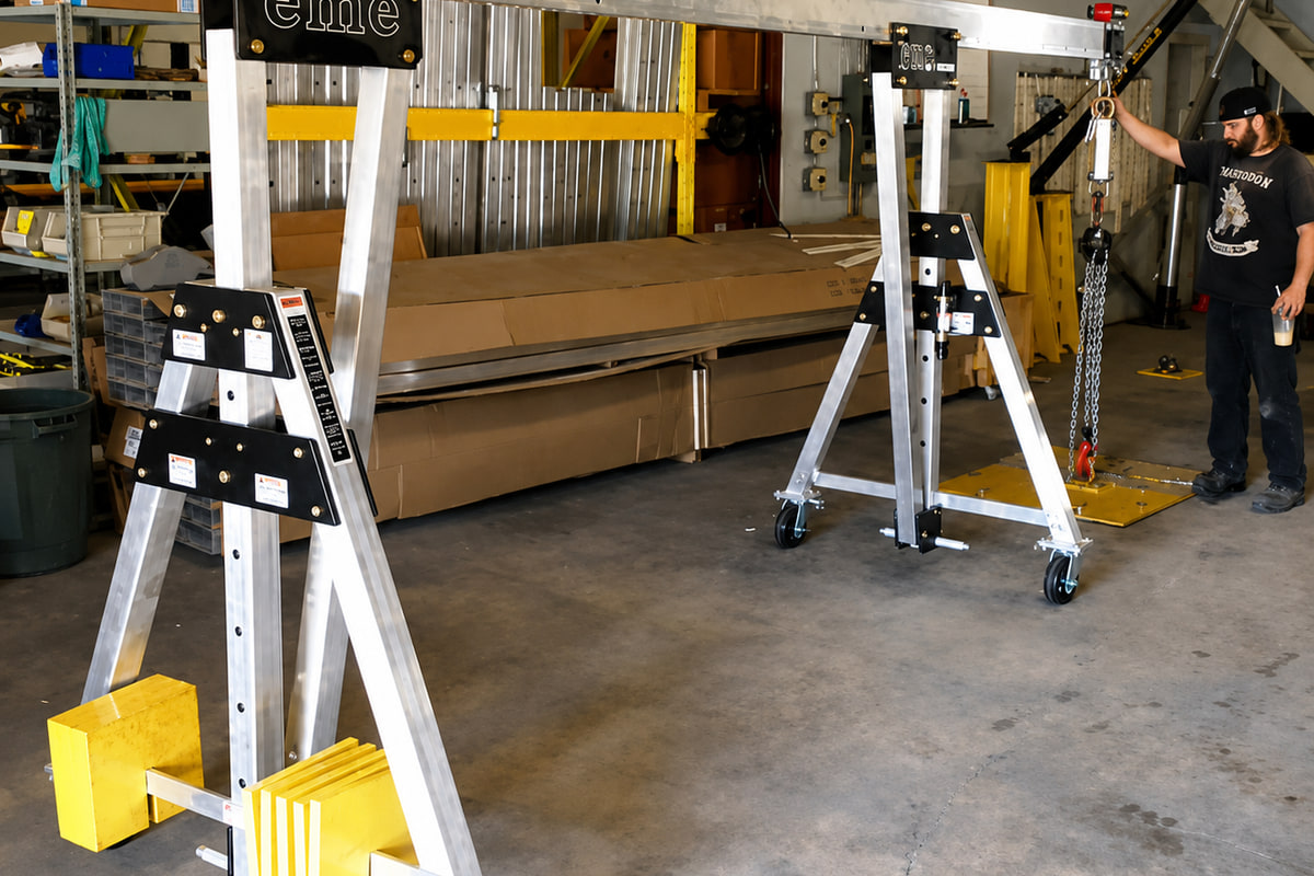 eme aluminum gantry fitted with a cantilever beam extension and stacked counterweights